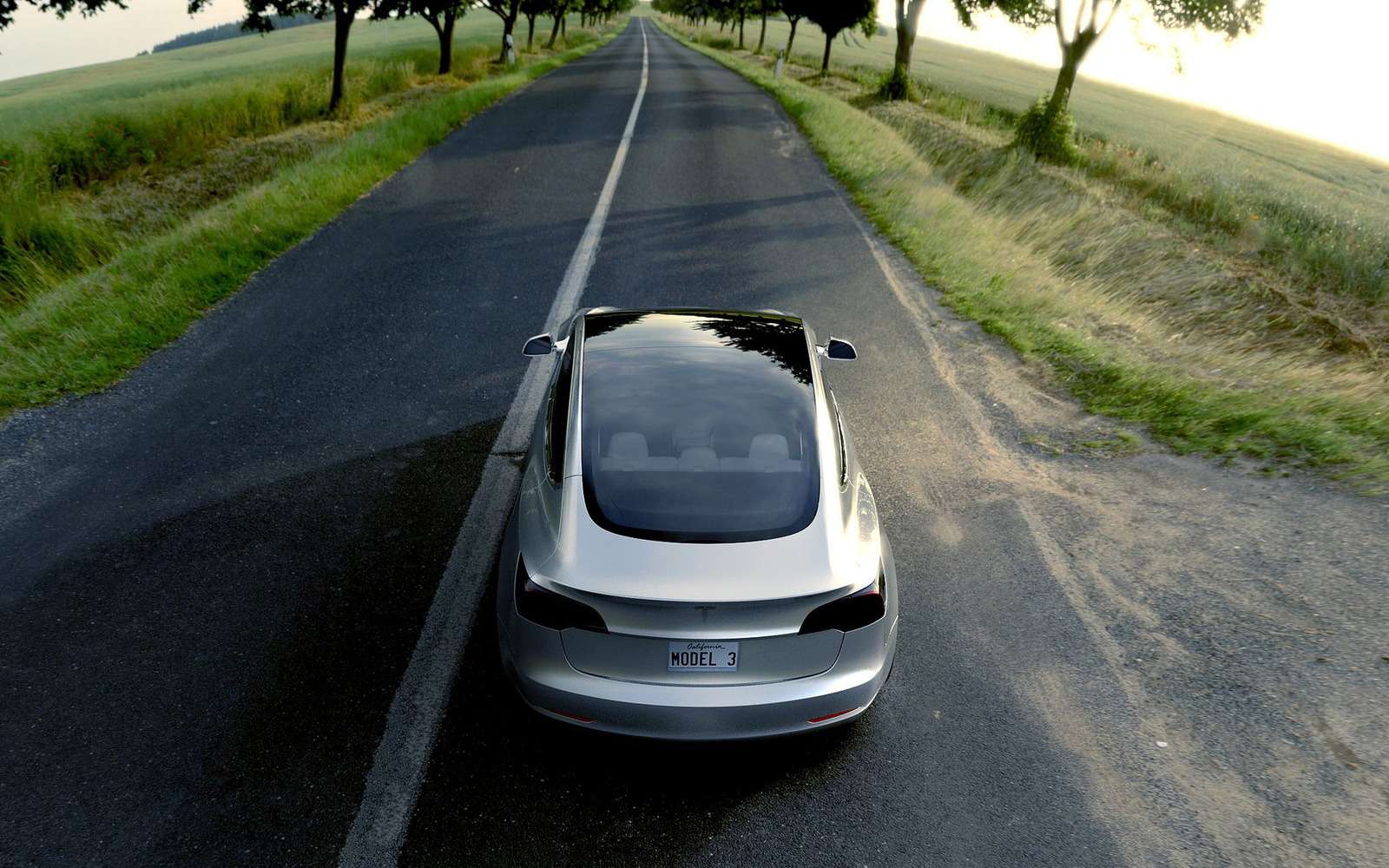 В России начали прием заказов на Tesla Model 3: цены объявлены — фото 844961