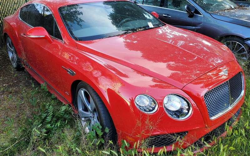 35 stolen luxury cars found in the backyard of a house