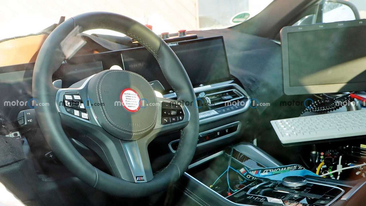 Первые фото рестайлинговой BMW X6: очень длинный экран — фото 1224537